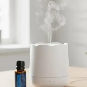 Adaptiv doTERRA obok dyfuzora aromaterapeutycznego doTERRA