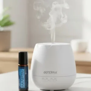 Adaptiv Touch doTERRA obok dyfuzora aromaterapeutycznego doTERRA