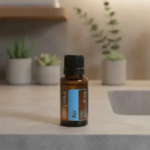 Air doTERRA na kamiennej podstawce obok złożonych ręczników spa