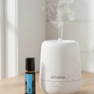 Air Touch doTERRA obok dyfuzora aromaterapeutycznego doTERRA