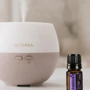 Anchor doTERRA obok dyfuzora aromaterapeutycznego doTERRA