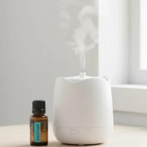Aromatouch doTERRA obok dyfuzora aromaterapeutycznego doTERRA