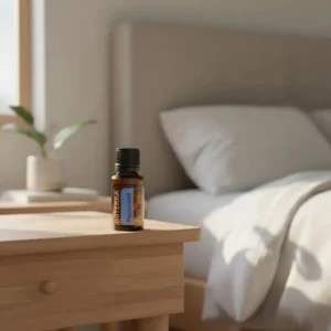 Olejek eteryczny Mięta Pieprzowa doTERRA na drewnianym stoliku nocnym przy łóżku
