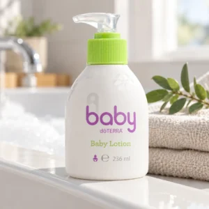 Balsam dla niemowląt doTERRA baby na brzegu wanny obok ręczników