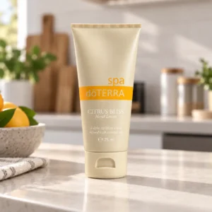 Balsam do rąk Citrus Bliss doTERRA na kuchennym blacie obok miski cytryn