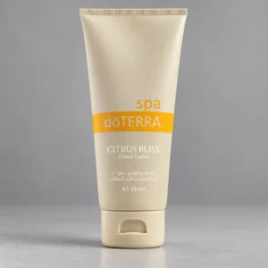 Tubka balsamu do rąk Citrus Bliss doTERRA na szarym tle