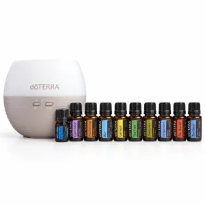 Home Essentials doTERRA, zestaw 10 olejków eterycznych i dyfuzor Petal 2.0 na białym tle