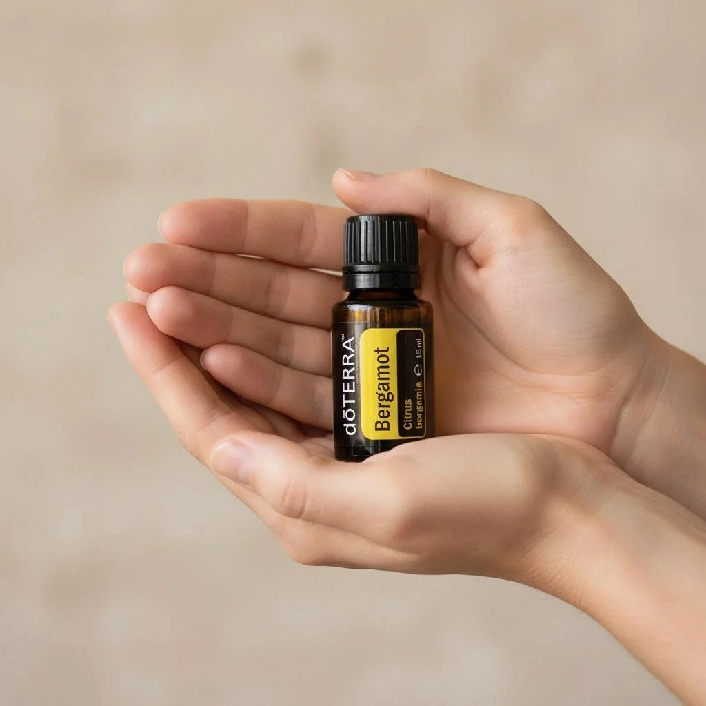 Bergamotka doTERRA obok dyfuzora aromaterapeutycznego doTERRA