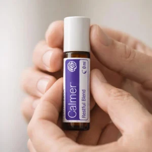 Calmer doTERRA obok dyfuzora aromaterapeutycznego doTERRA