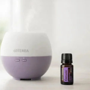 Console doTERRA na białym blacie kuchennym