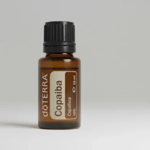 Copaiba doTERRA na szarym tle – ujęcie produktowe