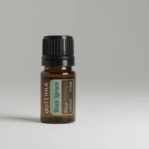 Czarny Świerk doTERRA na szarym tle – ujęcie produktowe