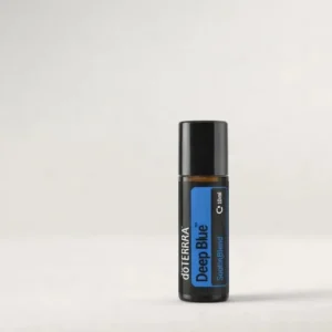Deep Blue Roll-on doTERRA na szarym tle – ujęcie produktowe