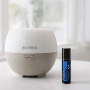 Deep Blue Touch doTERRA obok dyfuzora aromaterapeutycznego doTERRA