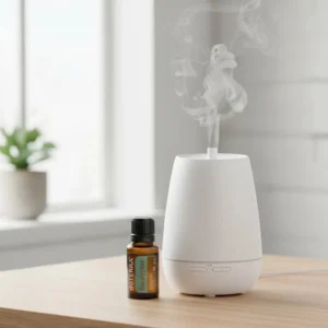 Dłonie trzymające Eukaliptus doTERRA – aplikacja olejku
