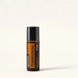 Frankincense Touch doTERRA na szarym tle – ujęcie produktowe