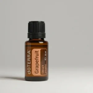 Grejpfrut doTERRA na szarym tle – ujęcie produktowe