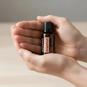 Grejpfrut doTERRA obok dyfuzora aromaterapeutycznego doTERRA