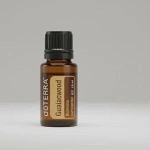 Gwajakowiec doTERRA na szarym tle – ujęcie produktowe