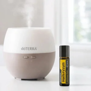 Helichrysum Touch doTERRA obok dyfuzora aromaterapeutycznego doTERRA