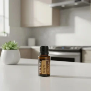 Dłonie trzymające Imbir doTERRA – aplikacja olejku