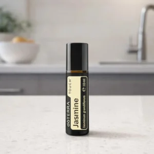 Jasmine Touch doTERRA obok dyfuzora aromaterapeutycznego doTERRA