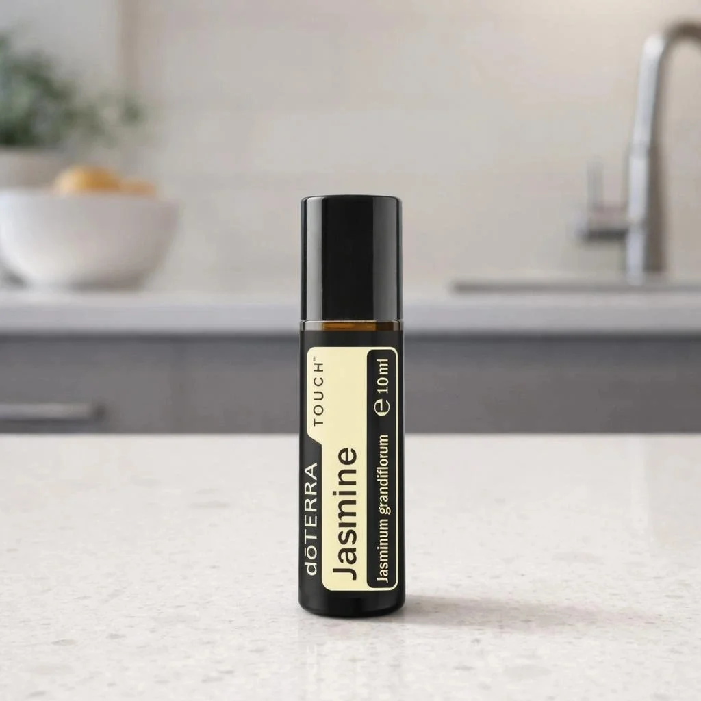 Jasmine Touch doTERRA obok dyfuzora aromaterapeutycznego doTERRA