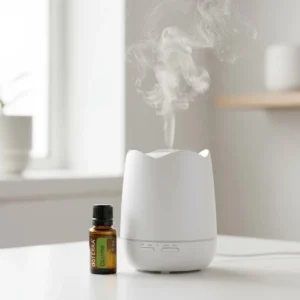Kolendra (nać) doTERRA obok dyfuzora aromaterapeutycznego doTERRA