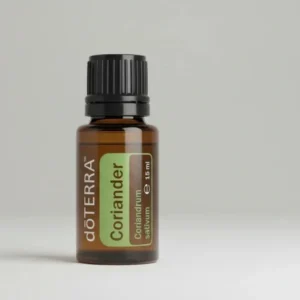 Kolendra (nasiona) doTERRA na szarym tle – ujęcie produktowe