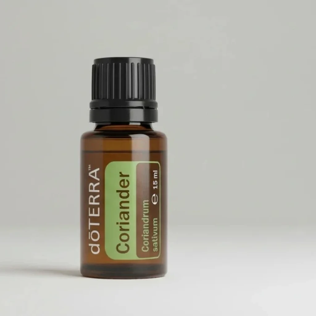 Kolendra (nasiona) doTERRA na szarym tle – ujęcie produktowe