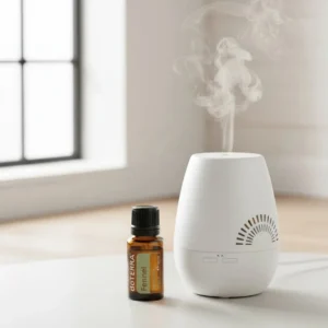 Koper doTERRA obok dyfuzora aromaterapeutycznego doTERRA