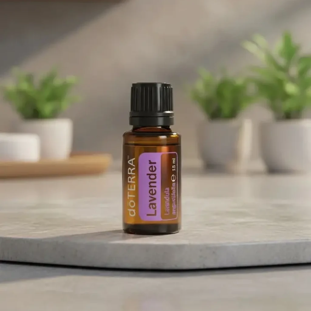 Lawenda doTERRA na kamiennej podstawce obok złożonych ręczników spa