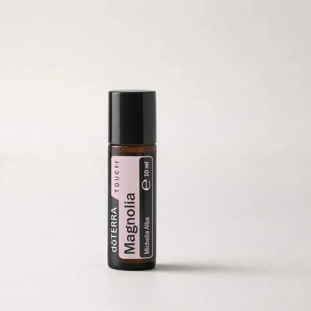 Magnolia Touch doTERRA na szarym tle – ujęcie produktowe