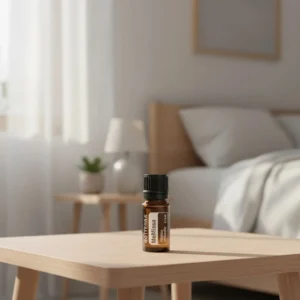 Melisa doTERRA na drewnianym stoliku nocnym przy łóżku