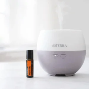 Motivate Touch doTERRA na białym blacie kuchennym