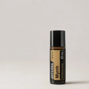 Myrrh Touch doTERRA na szarym tle – ujęcie produktowe