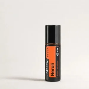Neroli Touch doTERRA na szarym tle – ujęcie produktowe