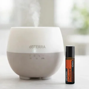 On Guard Touch doTERRA obok dyfuzora aromaterapeutycznego doTERRA