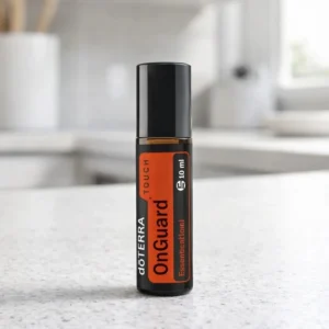 On Guard Touch doTERRA na białym blacie kuchennym