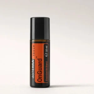 On Guard Touch doTERRA na szarym tle – ujęcie produktowe