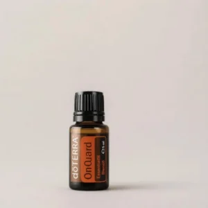 On Guard doTERRA na szarym tle – ujęcie produktowe