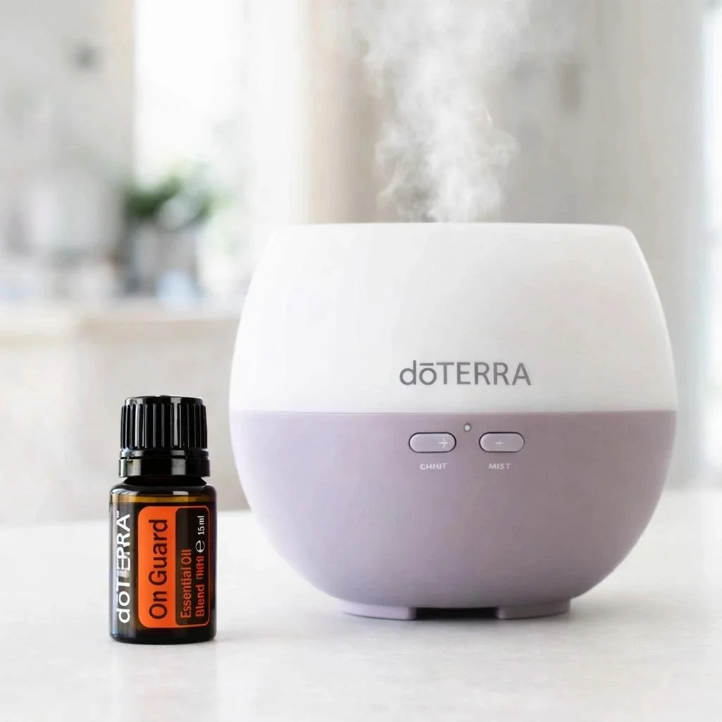 On Guard doTERRA na białym blacie kuchennym