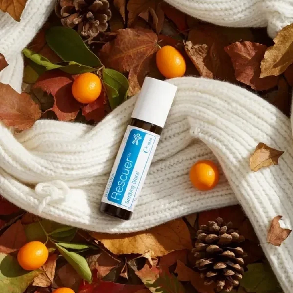 Rescuer doTERRA na jesiennej dekoracji z liśćmi i szyszkami