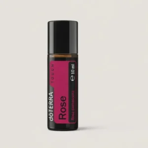 Rose Touch doTERRA na szarym tle – ujęcie produktowe