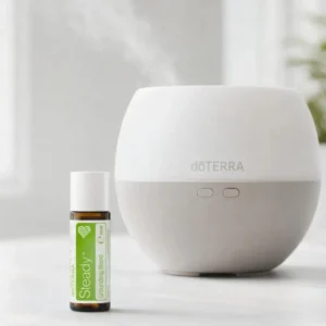 Steady doTERRA obok dyfuzora aromaterapeutycznego doTERRA