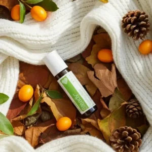 Steady doTERRA na jesiennej dekoracji z liśćmi i szyszkami