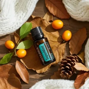 Supermint doTERRA na jesiennej dekoracji z liśćmi i szyszkami