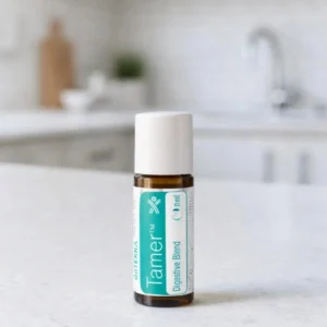 Tamer doTERRA na białym blacie kuchennym