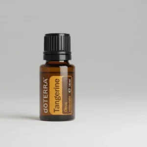 Tangerynka doTERRA na szarym tle – ujęcie produktowe