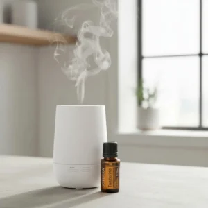 Tangerynka doTERRA obok dyfuzora aromaterapeutycznego doTERRA